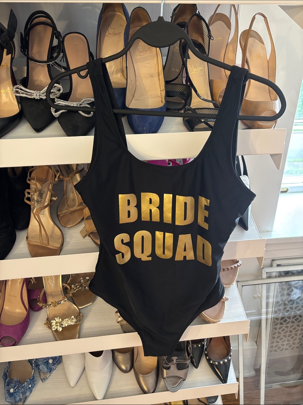Amazon Women Swim Black One-Piece Swimsuit with Gold 'BRIDE SQUAD' Print